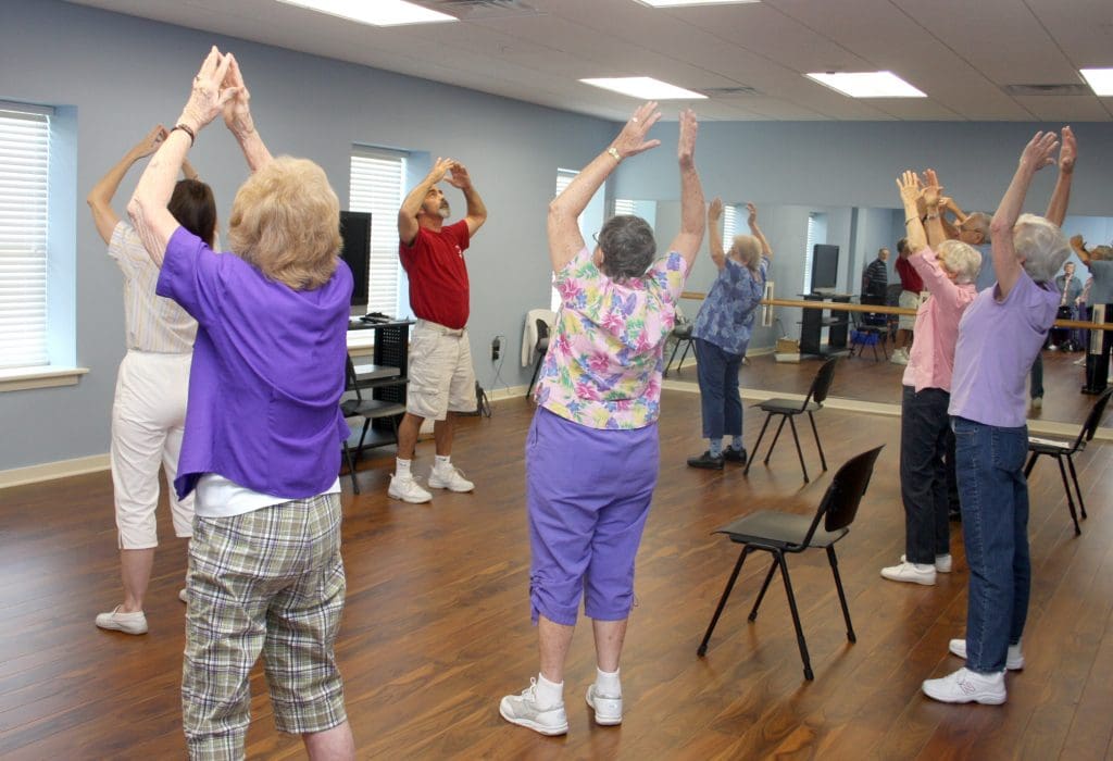 Older Adults in the Wellness Studio doing Tai Chi