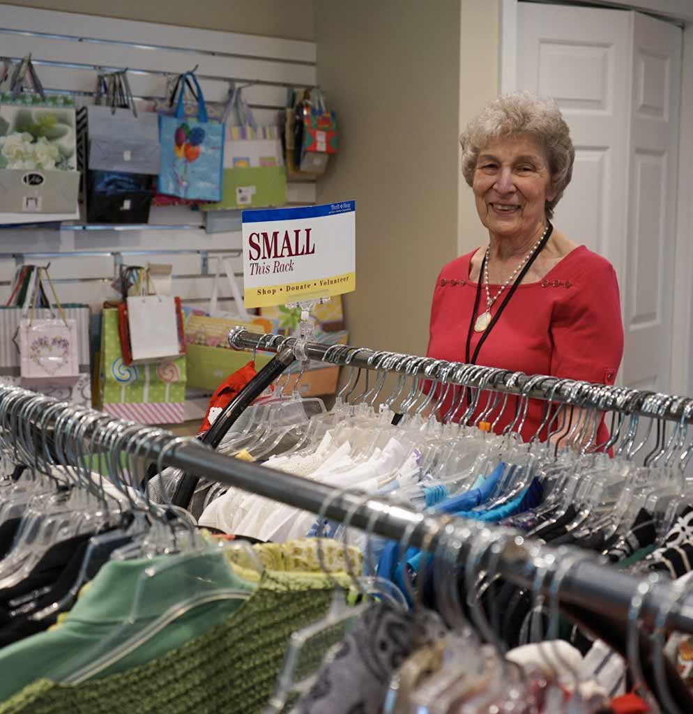 senior-thrift-store Senior Aged Woman Smiling at Male Companion
