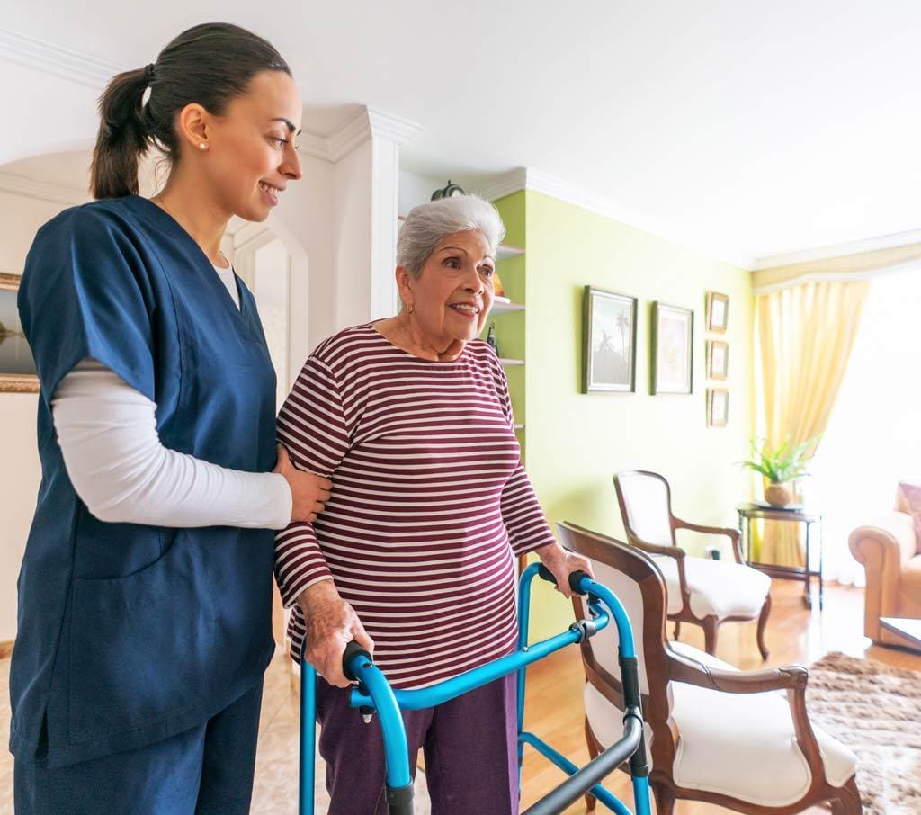 senior-care Two retired seniors taking a brisk walk around Peter Becker Community