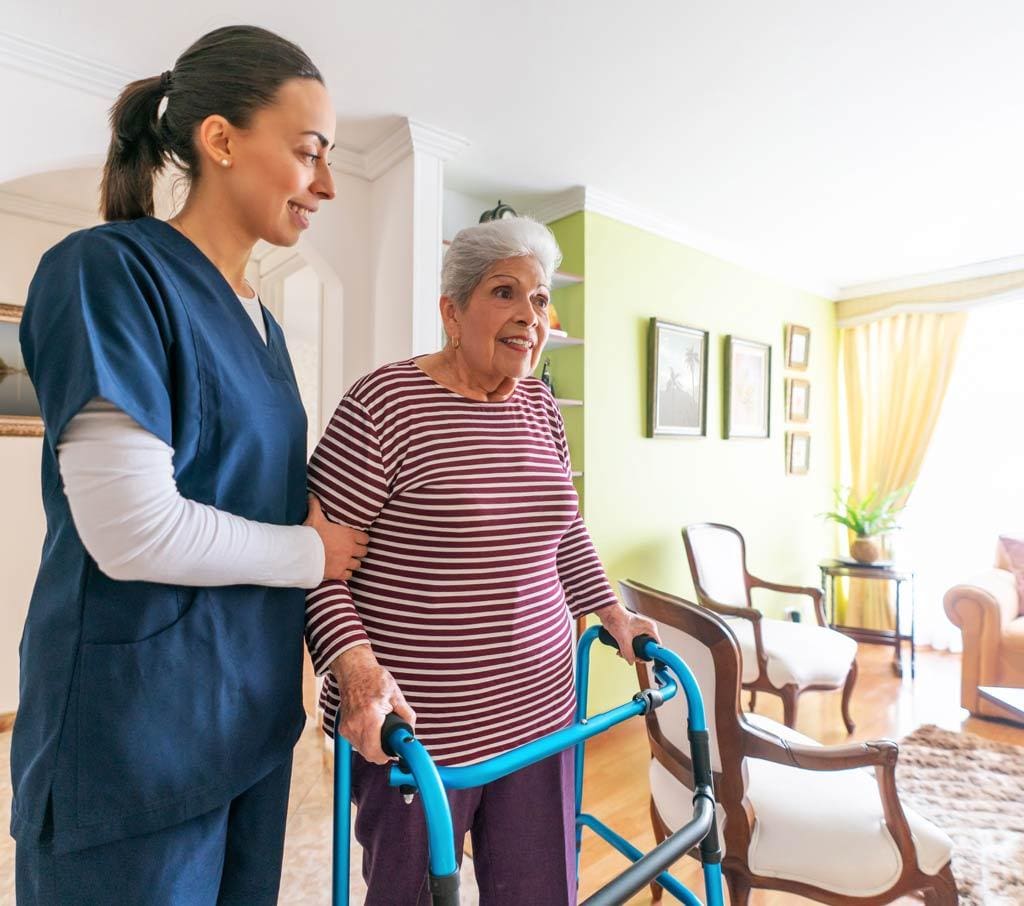 Two retired seniors taking a brisk walk around Peter Becker Community